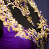 Purple beaded latin with golden lace